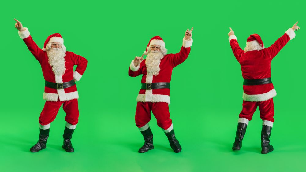 Studio Shot Isolated Mockup Template: Jolly Santa Claus Dancing On Green Screen Chromakey Background, Celebrating Christmas, New Years, Holiday Season. Happy And Joyful Celebration