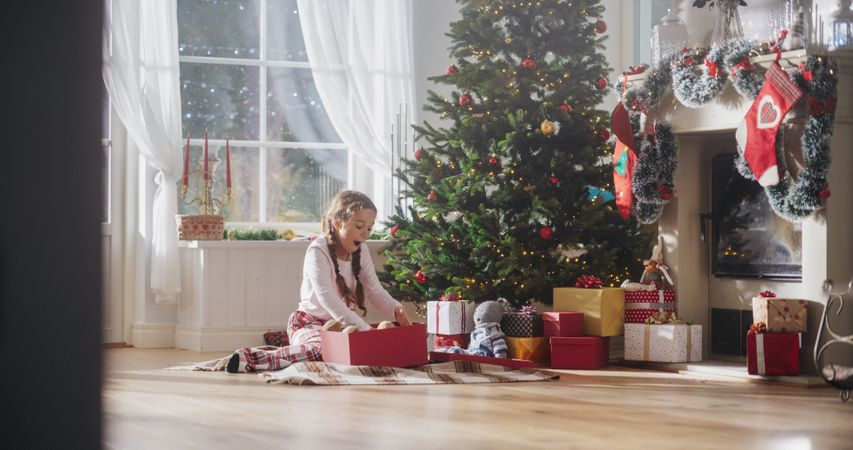 Cute Child Getting Her Gift from Santa