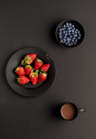 Fruits and hot beverage for breakfast
