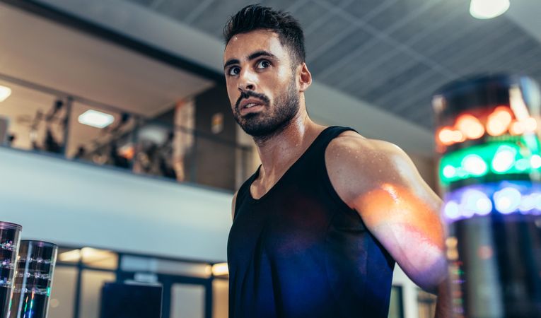 Man with lights around to improve reaction time at gym