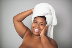 Cheerful plus size Black female model