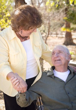 Happy Mature Couple Relaxing in The Park
