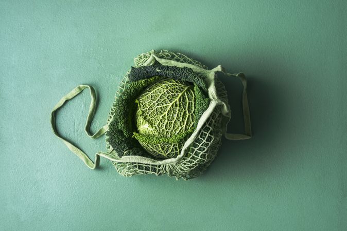 Savoy cabbage in eco-friendly fabric bag