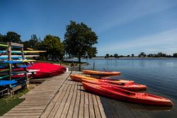 Bright-red kayaks at Brittingham Park's beach in Madison, Wisconsin beXzp4