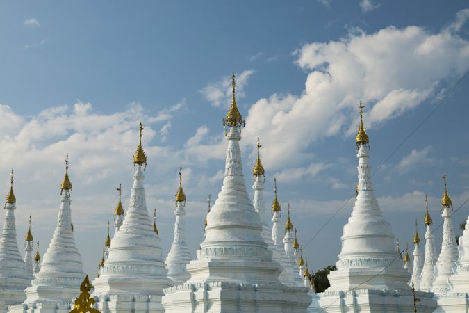 Cityscape of clouds and light Buddhist stupas in Sanda Muni Pagoda