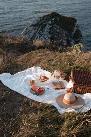 Picnic mat with romantically set near sea and mountains