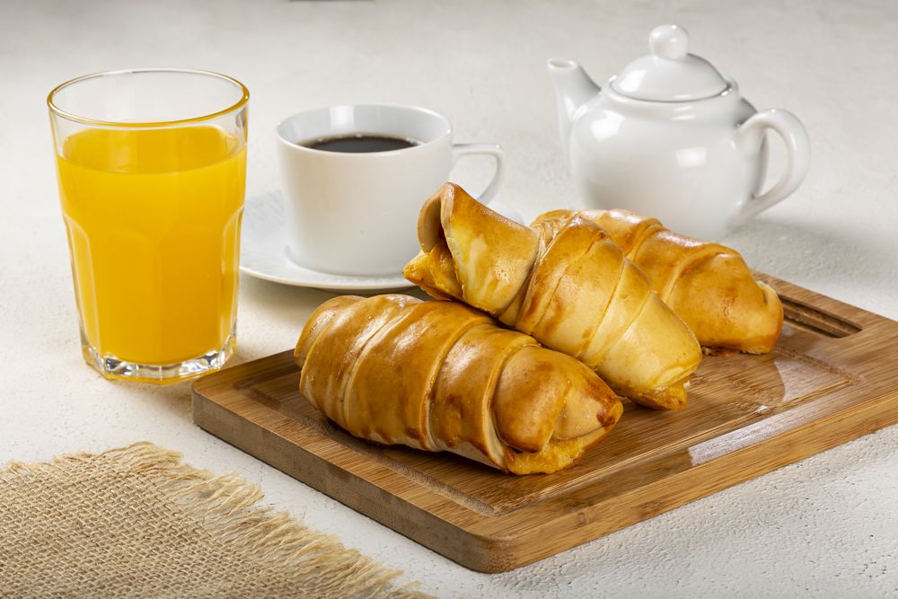 Traditional fresh baked croissants on the table.