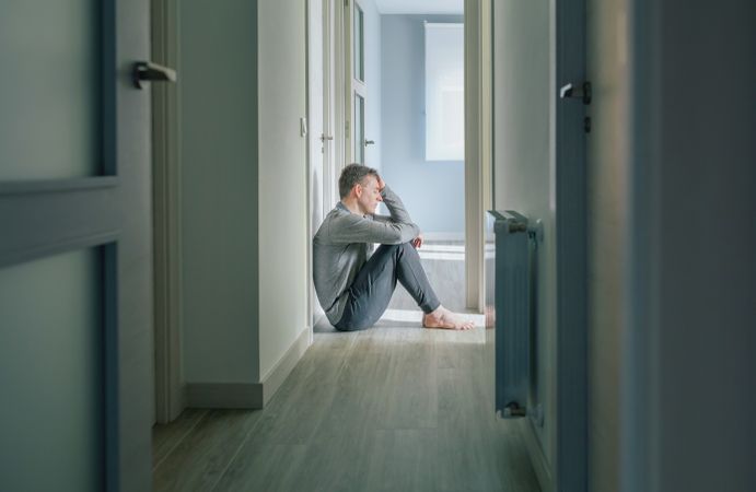 Man sitting on the floor