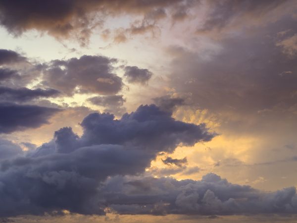 Dark Clouds and Orange Sky