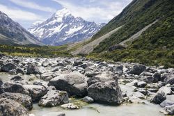 Mountain rocky river and cliffs at New Zealand