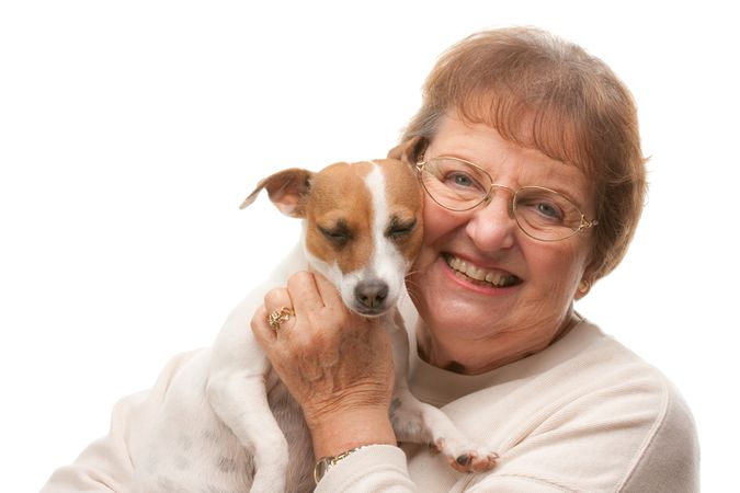 Happy Older Woman with Puppy.
