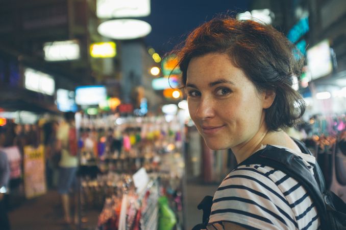 Female traveler in souvenir shop