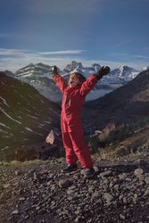 Boy enjoying freedom in mountains