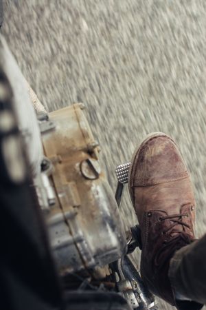 Crop leg on motorcycle pedal