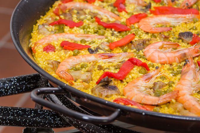 Traditional spanish paella cooked in a pan