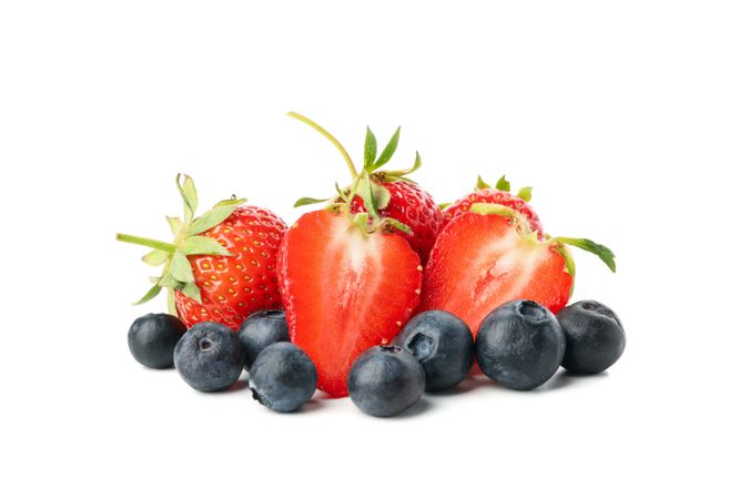 Tasty red strawberry and blueberry isolated on blank background