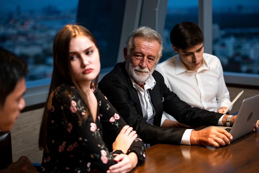 Colleagues working together after hours in an office