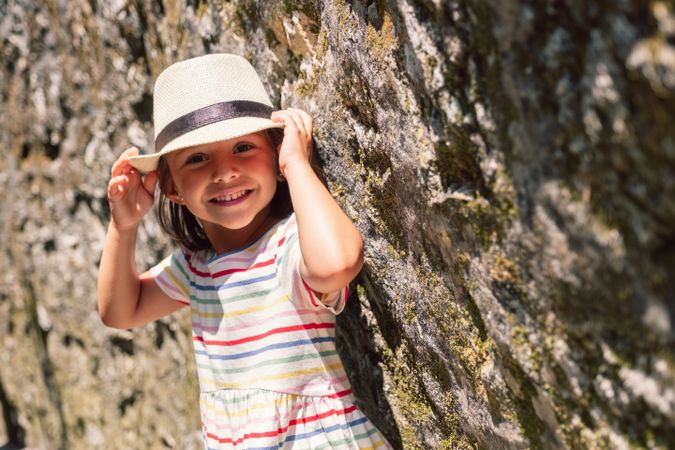 Girl in narrow stone walkway