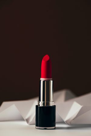 Red lipstick on raised chevron, Product and make up contemporary concept
