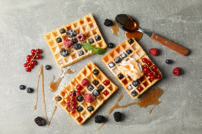 Flat lay composition with sweet belgian waffles, space for text
