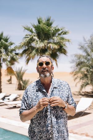 Bearded older man on resort
