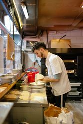 Pizza man making pizza shape