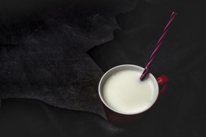 Cup of milk on table