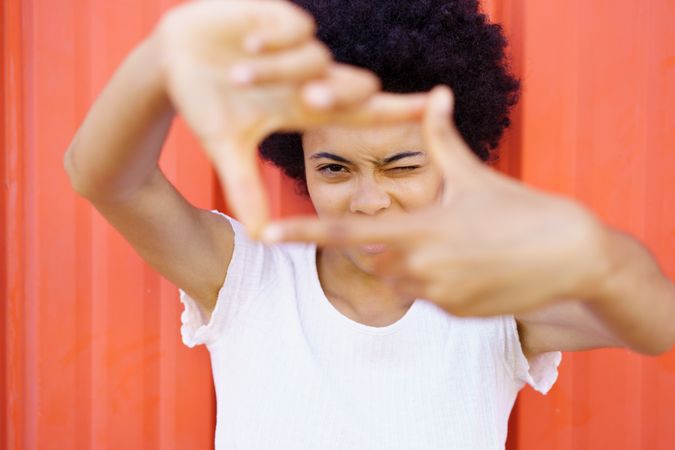 Woman making a square frame with hands