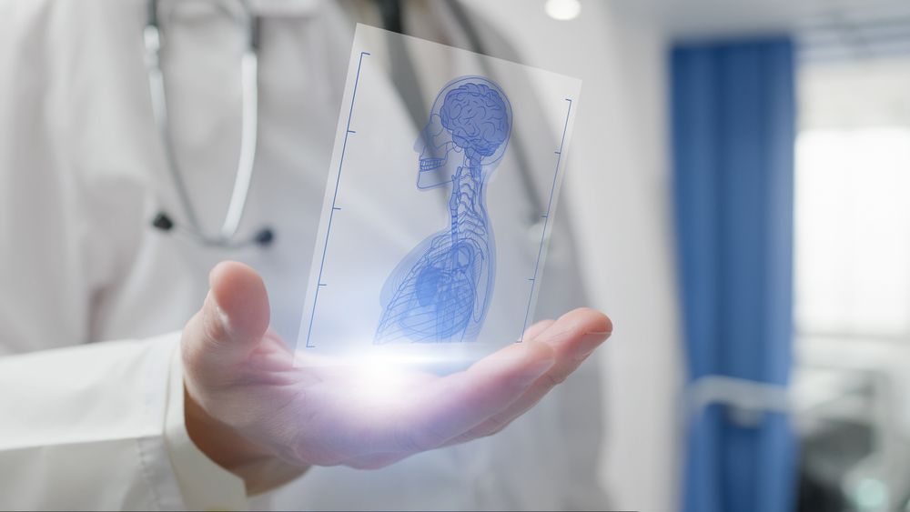 Doctor analyzing X-ray hologram with AI