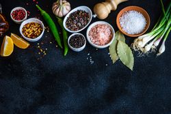 Counter with aromatics and garlic with copy space