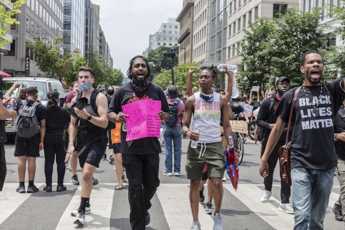 Group of people marching on the street for a BLM protest, Washington, D.C.