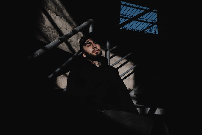 Modern man inside desolate building