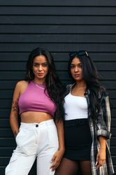 Portrait of two latina women outdoors