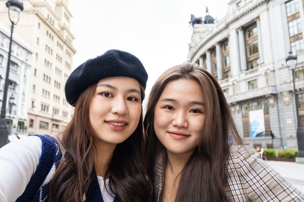 Selfie of Asian female friends in the city