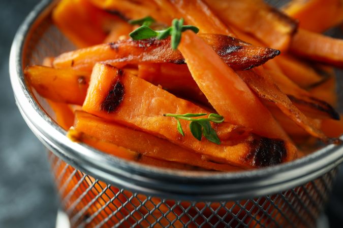 Concept of tasty food, fried sweet potato, close up