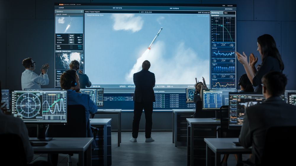 Mission Control Celebrates Successful Rocket Launch.