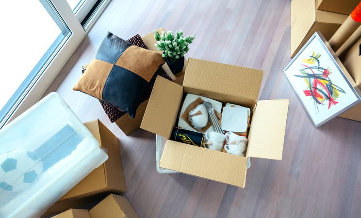 Living room with stack of moving boxes