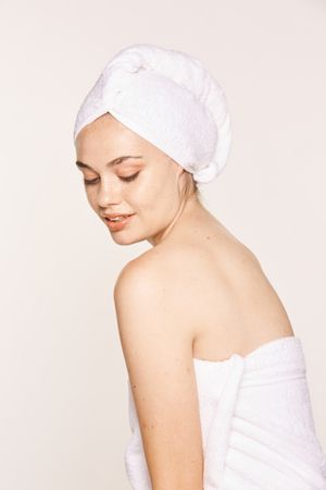 female with radiant body after cosmetic procedure