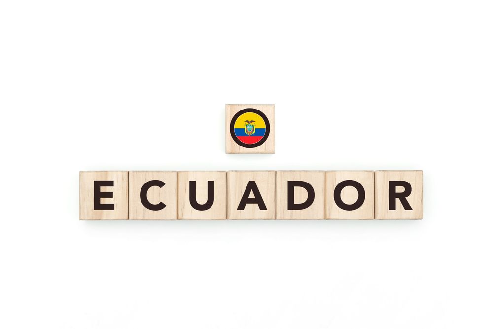 Wooden blocks bearing the name and flag of Ecuador.