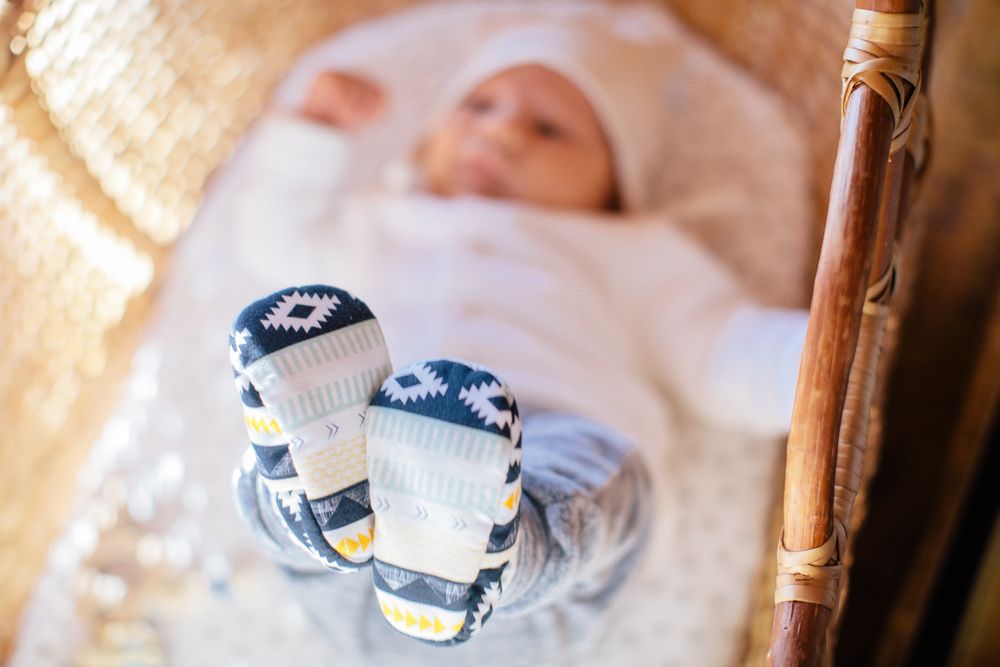 Baby lying in crib