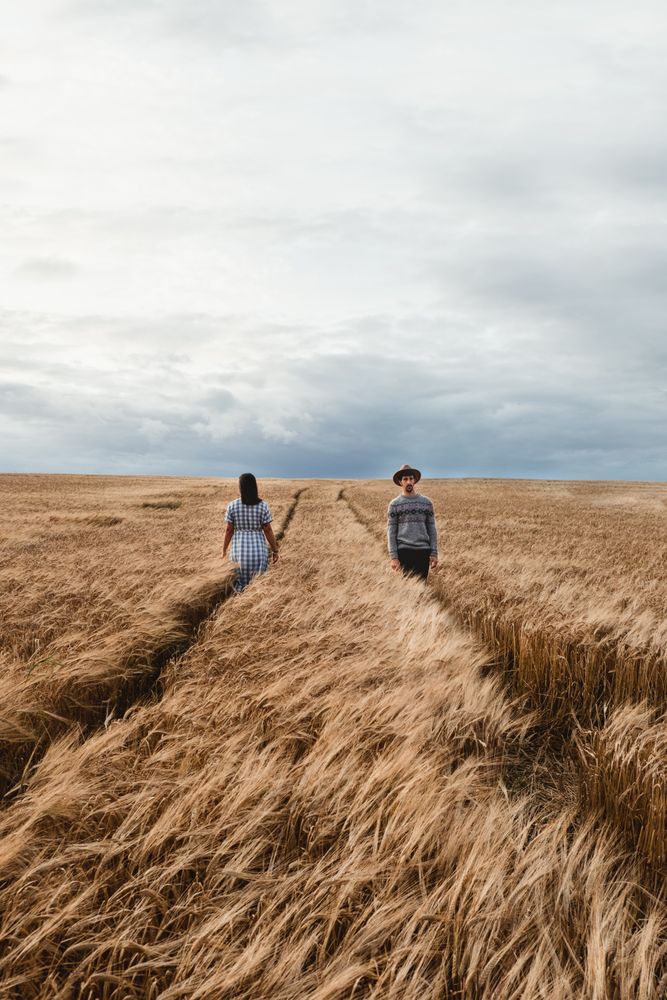 People walking on boundless field