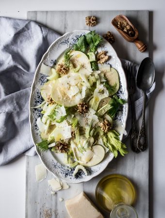 Gourmet salad with fruits, cheese and nuts