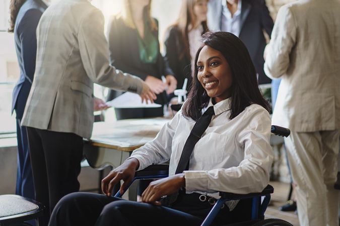 Portrait of a Black businesswoman in a wheelchair