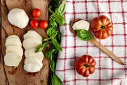 Salad ingredients on board and napkin