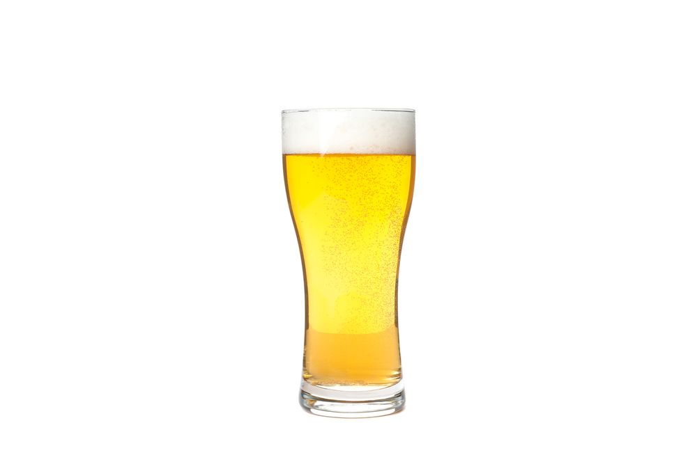 Glass of beer isolated on blank background