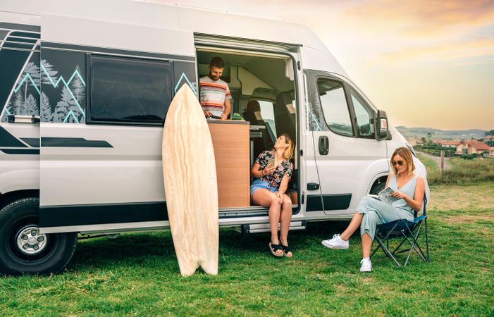 Group of friends traveling in a camper van