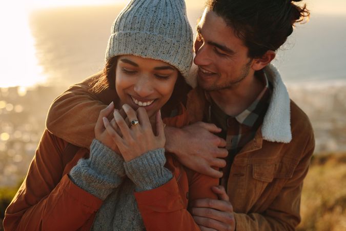 Close up portrait of affectionate young couple on winter holiday