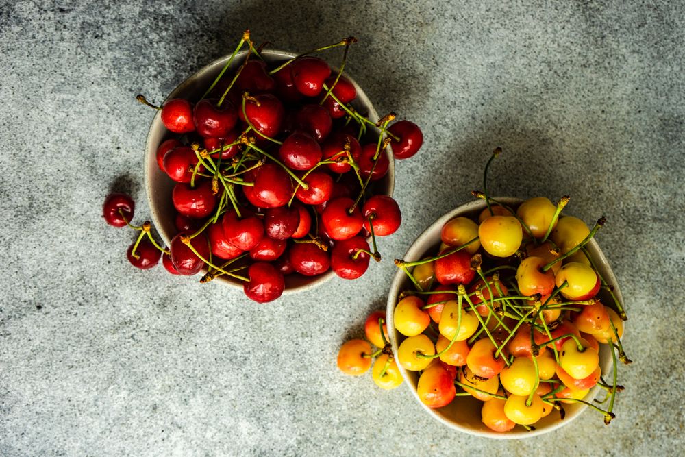 Top view of summer cherries in bowl