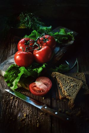 Fresh tomatoes on wooden table