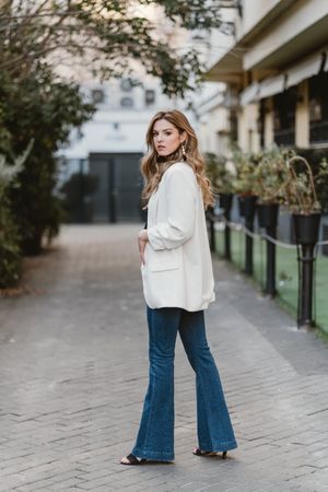 Charming woman posing on street